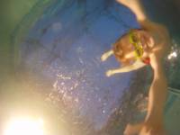 Ethan swimming in the villa pool.  &raquo; Click to zoom ->